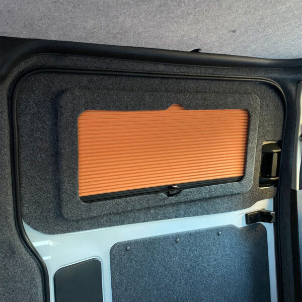 ford transit custom window pod k with orange blind and dark coloured carpet